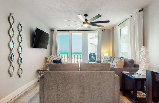 Beachfront fifth-floor condo with Gulf views, W/D, outdoor pool, & grill access
