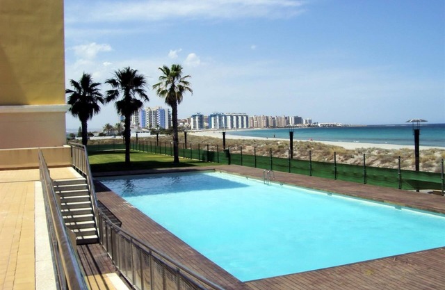 Beachfront Penthouse with Wi-fi & Pool