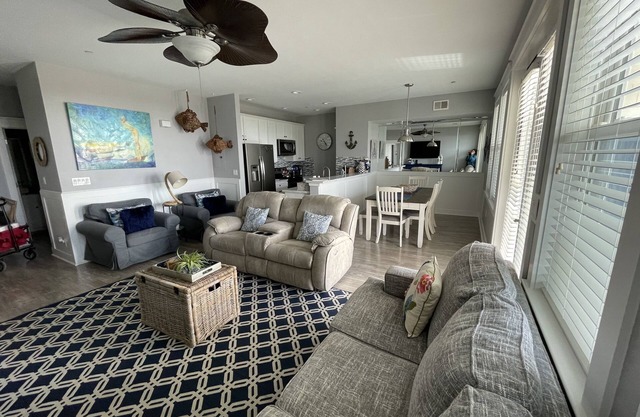 Beachfront, top floor condo steps away from Pointe West Beach Club and beaches.