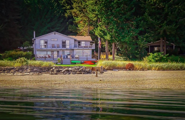 Beachfront vacation home on the most amazing mountain view beach