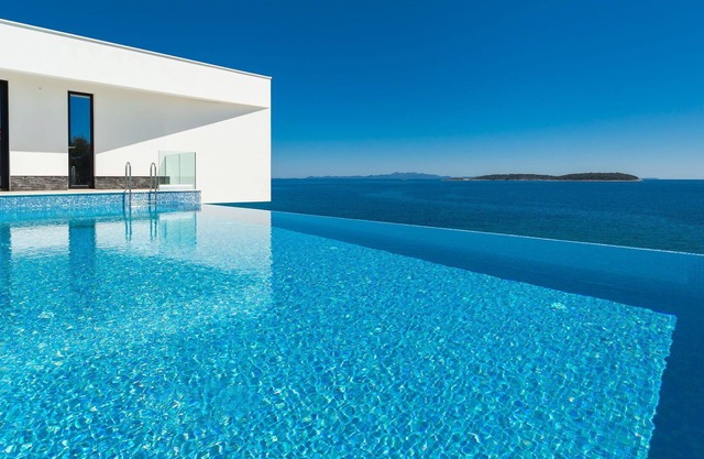 Beachfront Villa Blue Heaven with Pool