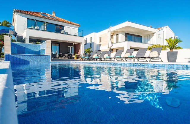 Beachfront Villa Blue Melody with Pool