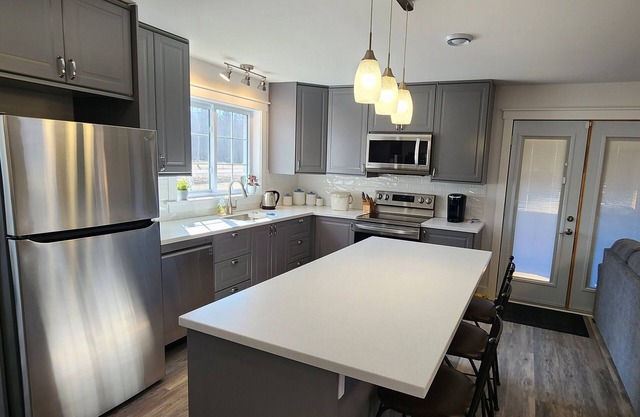 Beausoleil Saltwater Sunsets RnR on Acadian Coast with WiFi, Hot Tub, Air Hockey