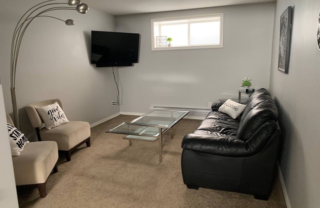 BEAUTIFUL 2 Bedroom Suite Close To The Airport minutes from downtown/hospital.