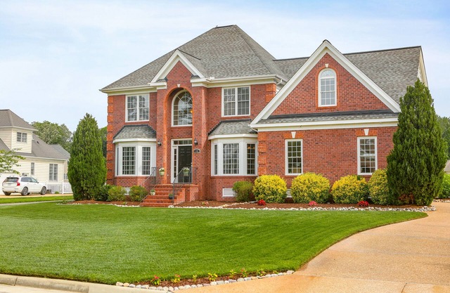 Beautiful 2 story brick home on a cul-de-sac. A beautiful pond in the back yard
