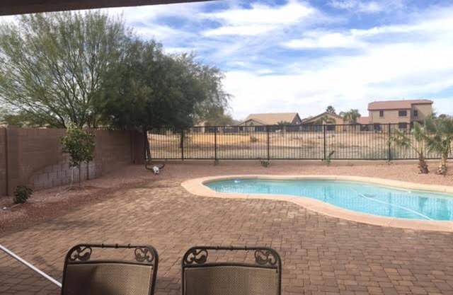 Beautiful 4 Bdrm home with a private pool and golf course views