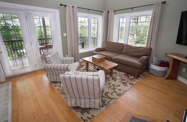Beautiful 5 bedrooms waterfront cottage sits on a private 4 acres wooded lot!