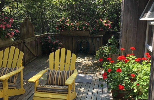 BEAUTIFUL, AIRY TWO-STORY HOUSE JUST STEPS FROM THE BEACH