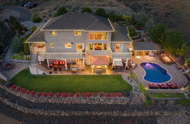 Beautiful estate with a breathtaking view, pool, hot tub, theater room & more!