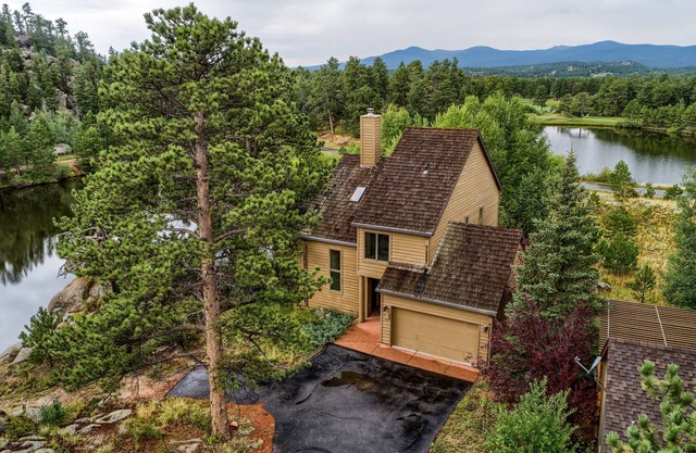 Beautiful lake home located in a gated golf course community in the mountains