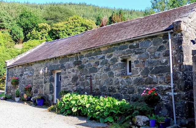 Beautiful riverside location. Stone barn with large enclosed garden.