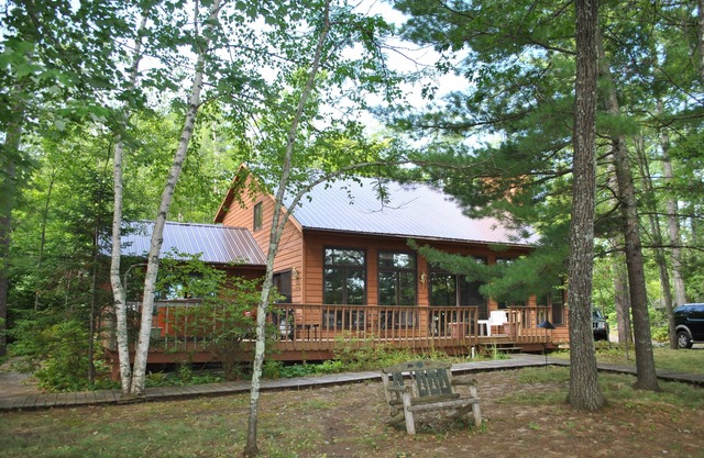 Beautiful round lake northern cedar modern vacation home