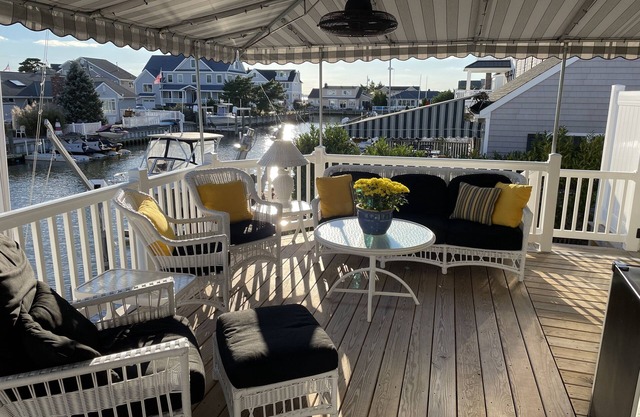 Beautiful WATERFRONT HOME WITH PRIVATE DOCK! Short walk to private ocean beach!