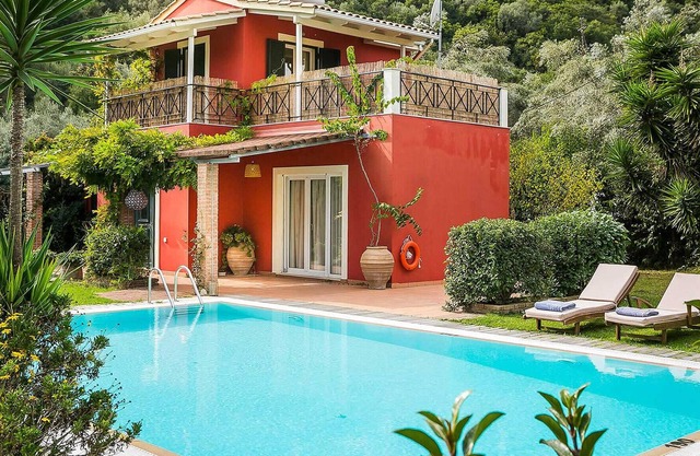 Beautifully located within stunning mature gardens and just a five minute walk from the beach, this