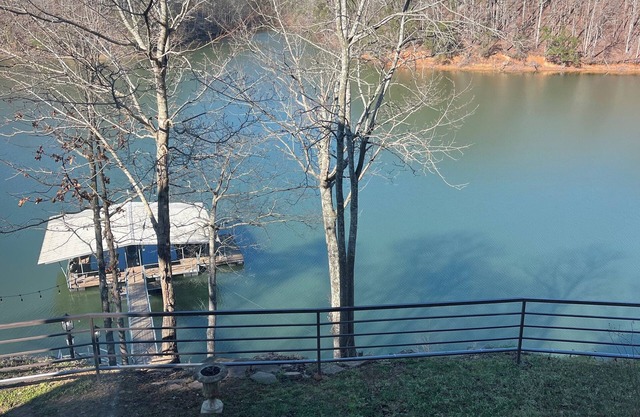 Beautifully renovated 5-bedroom home on Smith Lake with 2 slip boat dock.