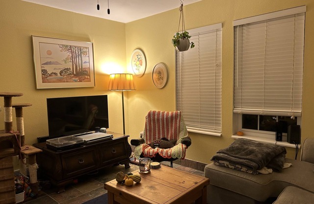 Bedroom in a cozy home with amenities!