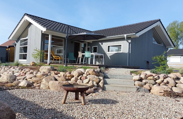 Behagliches Holzhaus mit Sauna im Skandi-stil am Großen Zechliner See