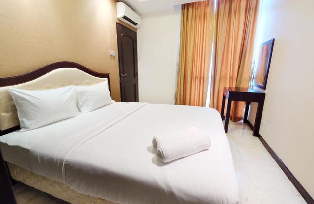 Bellagio Apartment 2BR near Kuningan City By Travelio
