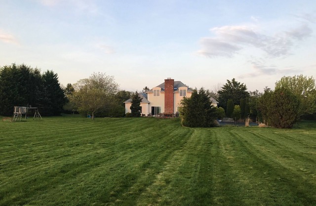 Best sunsets in the Hamptons. This home has it all. Best location in Water Mill.