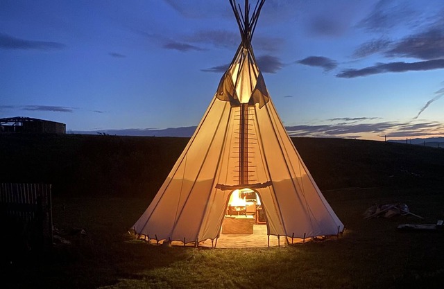 Blackfoot Tipi Lodging under the Prairie Sky.