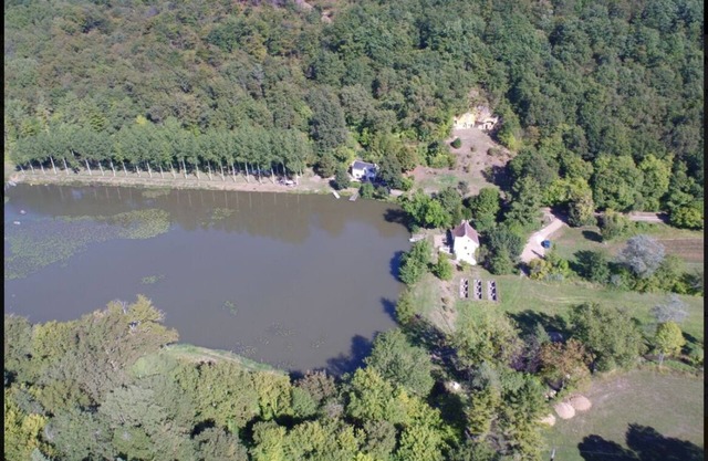 boat-cabin on fishing pond in protected natural area