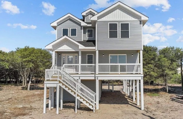 BRAND NEW 4-bedroom home in the 4X4, Corolla, NC. A truly unique getaway!