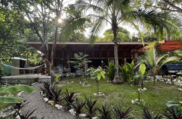 Brand New, PRIVATE, beach house with tropical garden 200 meters walk to beach