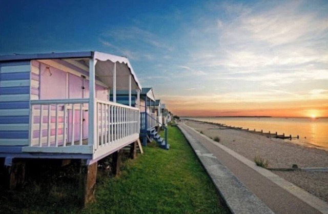 Breakwater house stone throw from the beach with an outside pool .