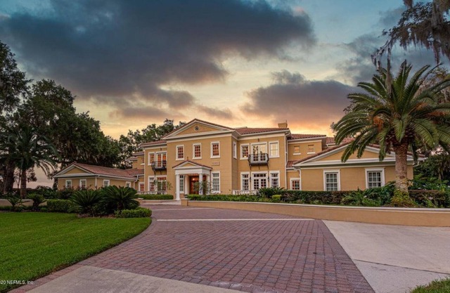BREATHTAKING RIVER FRONT ESTATE W/ BEAUTIFUL 150 ft PIER