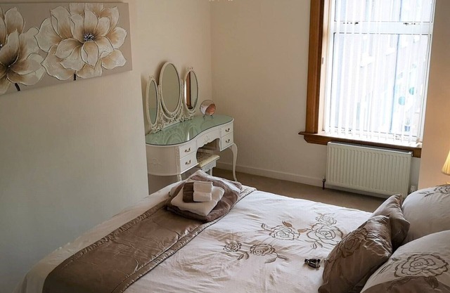 Bright, spacious centrally-located 3-bedroomed house with ample free parking.