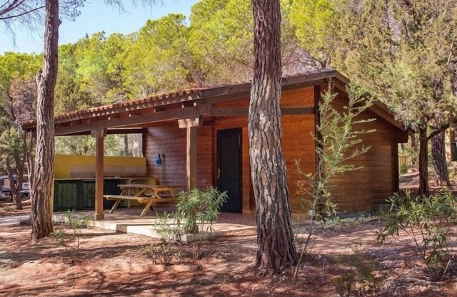 Bungalow for 4 people, 4 star camping of Cala Gonone, 200 m away from beach
