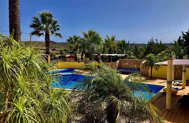Bungalow with apartment in a quiet location and large pool