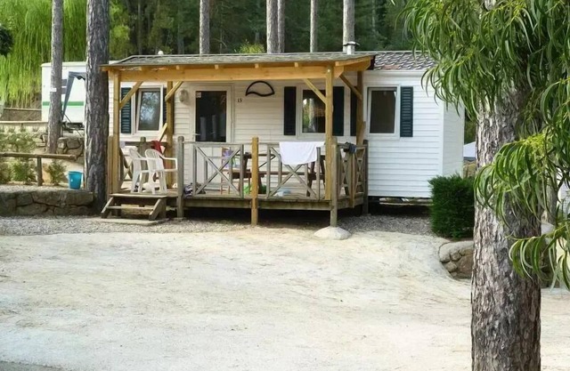 Camping Ushuaïa Villages les Pins d'Ucel * - MESANGE - mobile home 28 m² 4 to 5 people - 4 people. included in the price