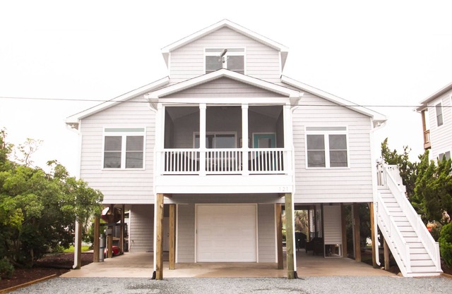 Canal Front Home-3-minute walk to beach with private boat dock