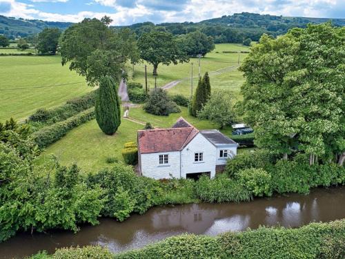 Canalside boathouse in the park