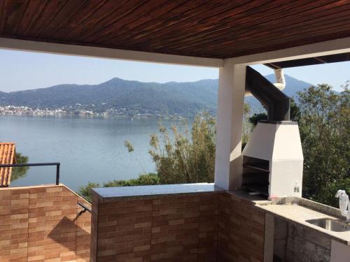 Casa 2 suítes Lagoa Conceição Praia Mole