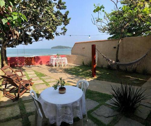 Casa aconchegante pé na areia c/5 quartos.