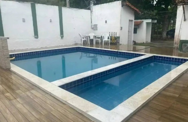 Casa Térrea Aconchegante de 1/4 a 300 Metros da Praia em Condomínio Fechado