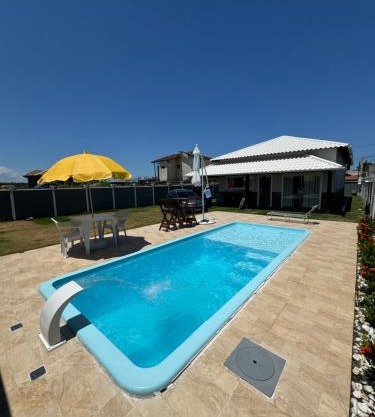 Casa com Piscina,Area gourmet,3 quartos,espaço Kids