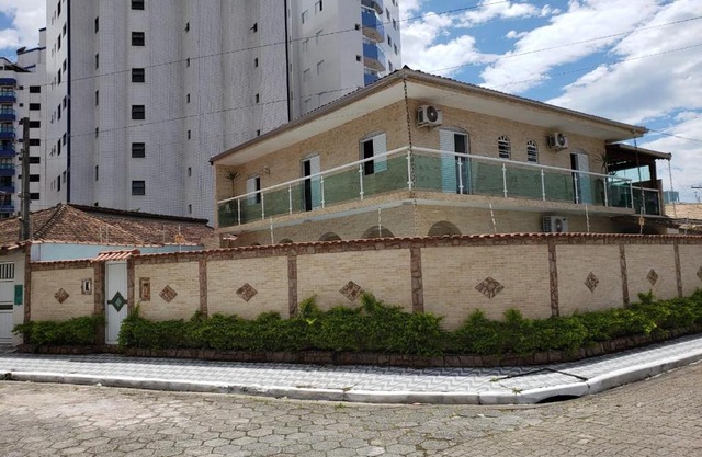 Casa com piscina na praia