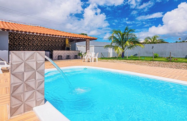 Casa com WiFi, churrasqueira e ótima localização