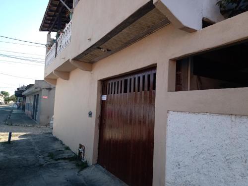 Casa conceito aberto aconchegante, perto de tudo e com garagem 64m2