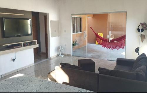 Casa da Cris em Praia do Grauçá com Wi-Fi, ar condicionado e garagem