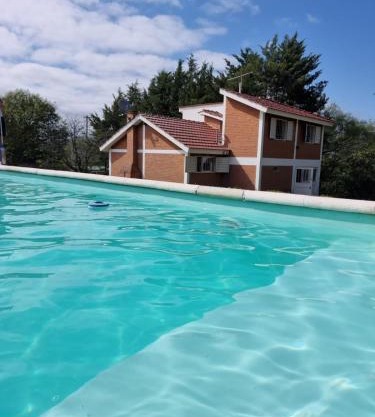 casa de campo a metros del lago