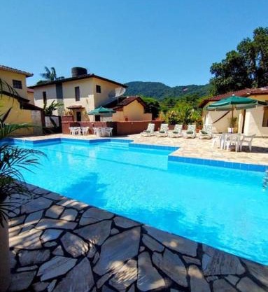 Casa de condomínio 900m da Praia de Boiçucanga