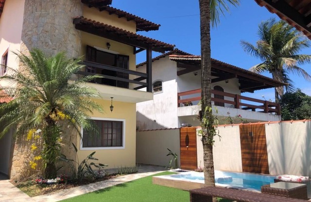 Casa de Praia com Piscina Aquecida, ar Condicionado, Cervejeira e Bilhar!