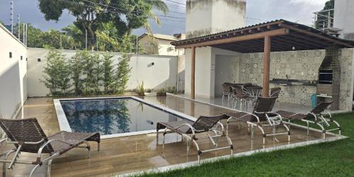 Casa Harmonia - 03 quartos sendo 01 suíte, próximo da praia, com piscina e área de churrasco