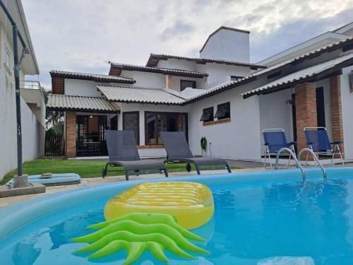 Casa Jurere Internacional com 6 quartos e piscina, churrasqueira , 300m do mar