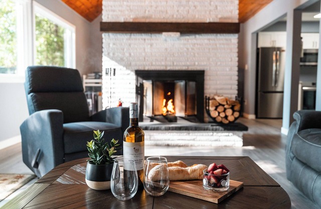 Cedar and Sand Lakehouse on Lake Kashagawigamog | Fireplace | Firetable | Dock