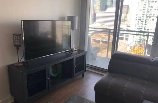 Central 2- bedroom condo w/parking